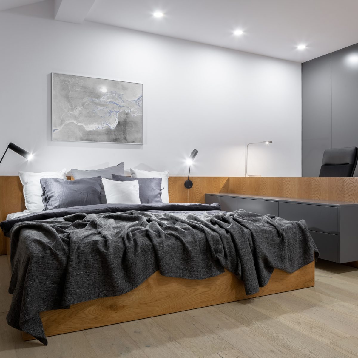 Stylish bedroom with wooden furniture