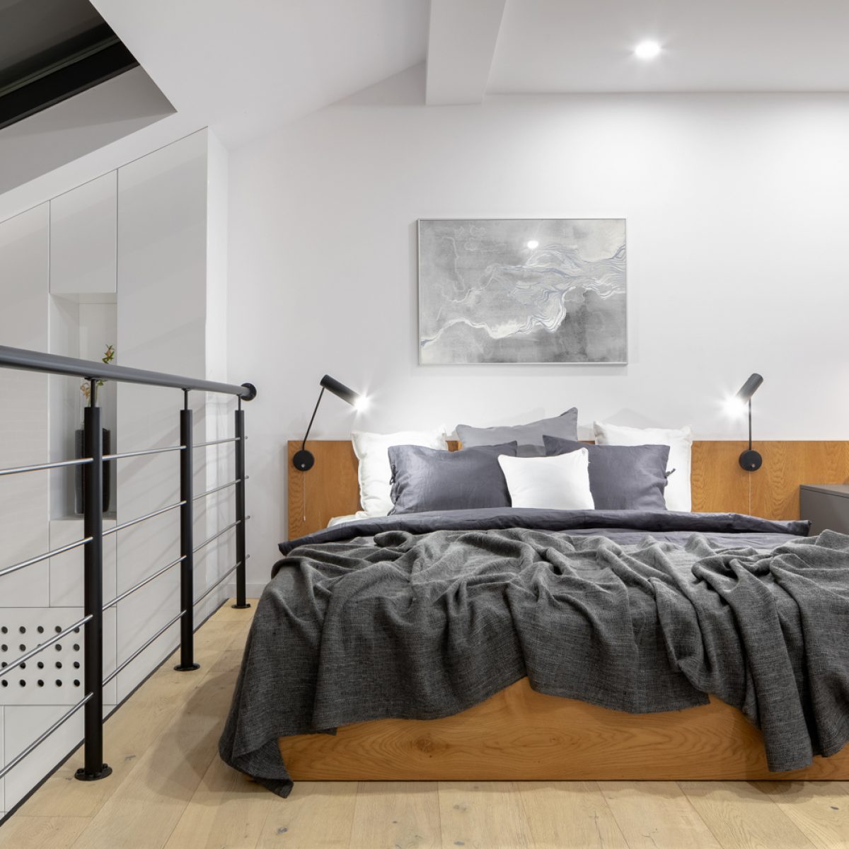 Bed and desk on mezzanine